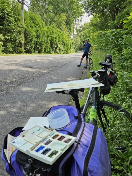 Packing up my plein-air painting supplies, while my sweetheart swats mosquitoes